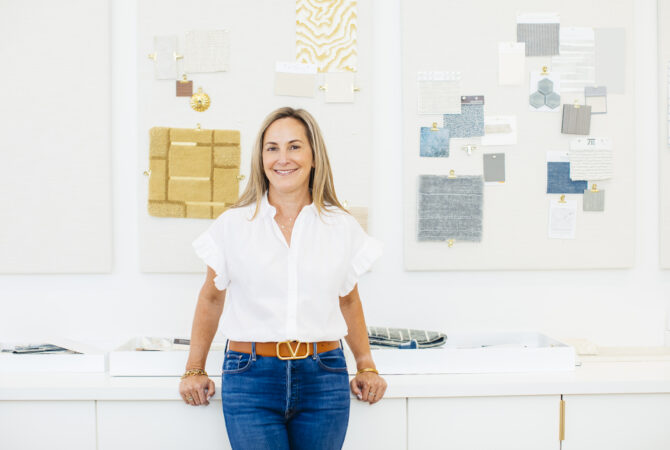 Julie Rootes '96 (entrepreneurial management/Neeley) poses in her studio at Julie Rootes Interiors in San Francisco, California, June 17, 2025